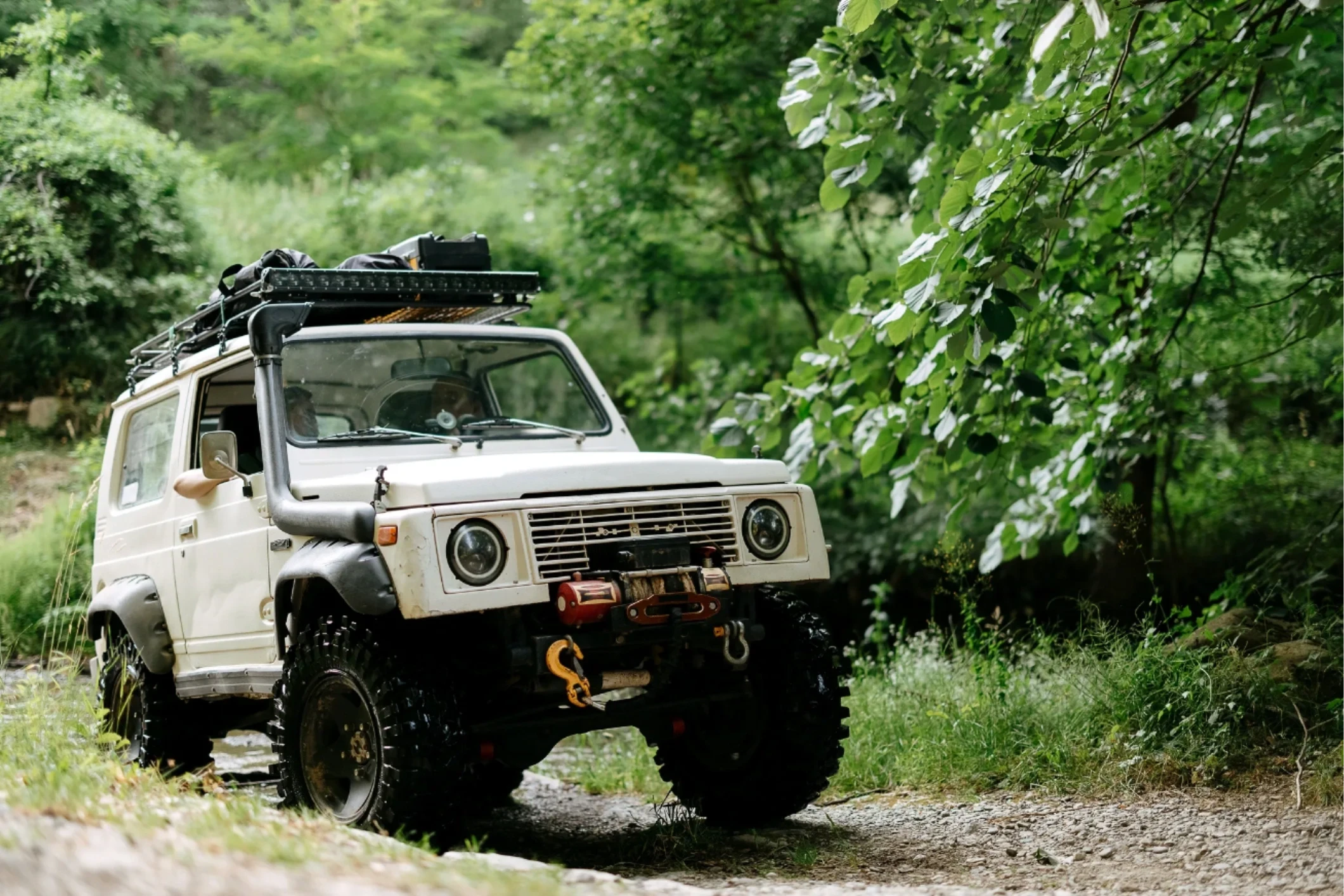 Off-road adventure vehicle on dirt trail